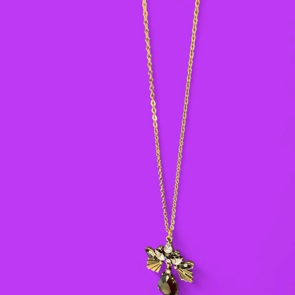 Goldtone rhinestone necklace w black glass gem flower bee style pendant